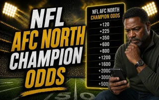 NFL AFC North Champion Odds promotional graphic featuring bold gold and white text over a nighttime football stadium with bright stadium lights. On the right, a thoughtful Black man in his late 40s studies betting odds on his smartphone beside a glowing odds board, creating a dramatic sports betting theme for NFL division futures wagering.